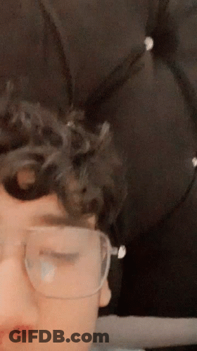 Person's Face Close Up With Glasses GIF