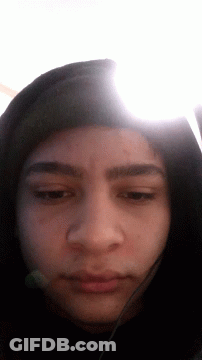 Person's Face Wearing Hooded Jacket GIF