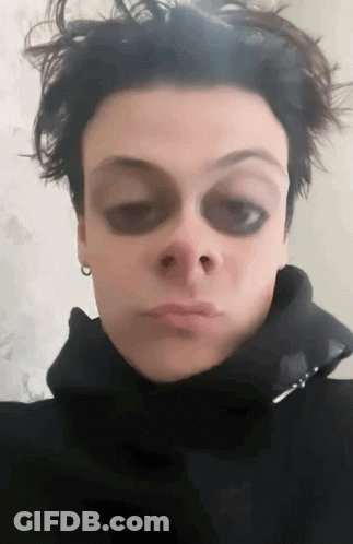Person's Face With Black Eye Circles GIF