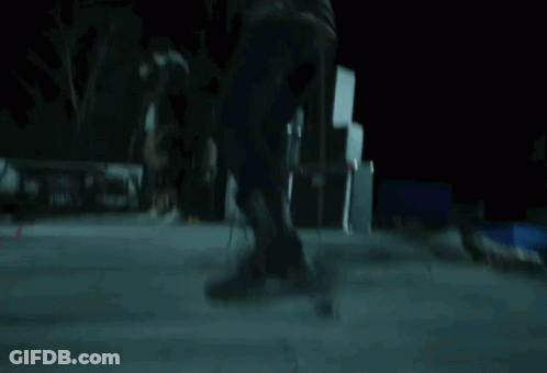 Person's Feet In Blurry Photo GIF