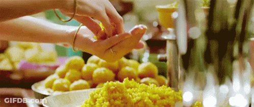 Person's Hand Holding Food GIF
