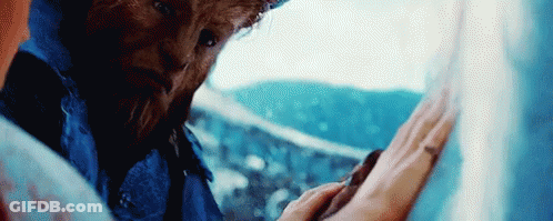 Person's Hand Holding Paper GIF
