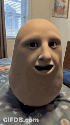 Person's Head Mask On Bed GIF