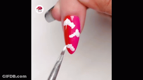 Person's Nails Being Painted GIF