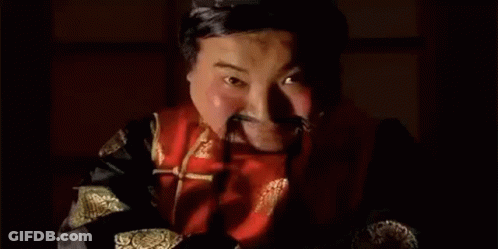Person's Neck And Ear In Red Dress GIF