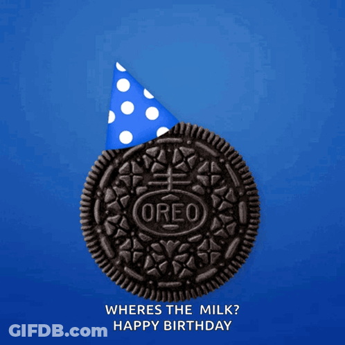 Person Scooping Ice Cream Into Cookie GIF