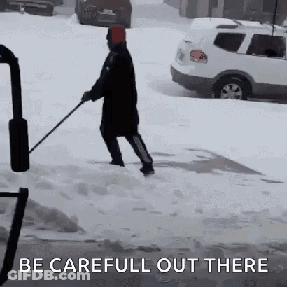 Person Shoveling Snow GIF