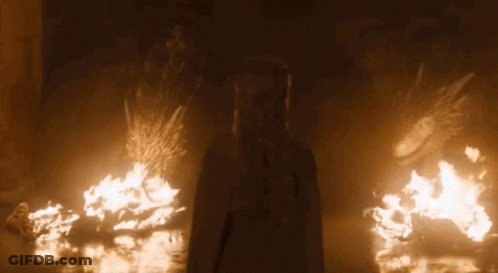 Person Silhouette In Front Of Fire GIF