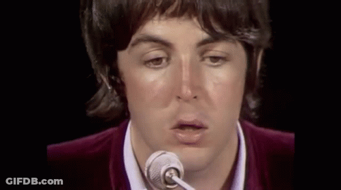 Person Singing Into Microphone GIF