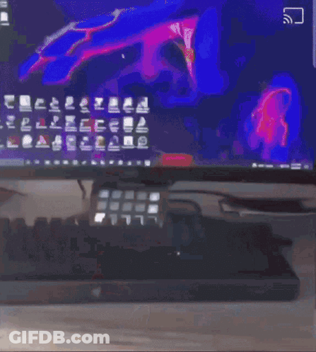 Person Sitting At Desk With Computer GIF