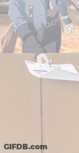 Person Sitting At Table With Paper Saying Chinese GIF