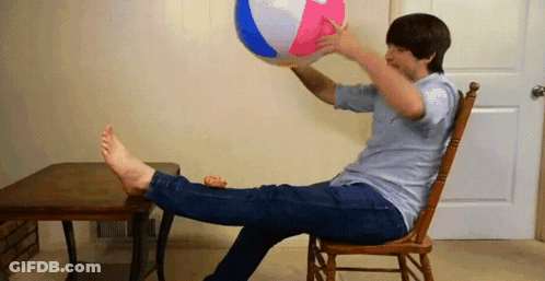 Person Sitting Cross-Legged On Floor GIF