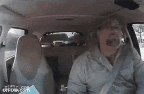 Person Sitting In Back Seat Of Car With Bottle Of Water GIF