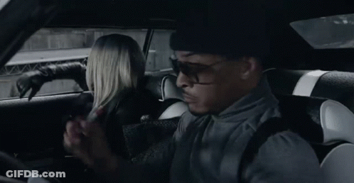 Person Sitting In Car Holding Paper GIF