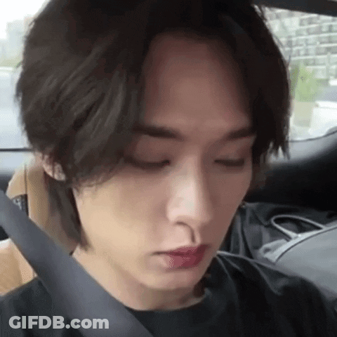Person Sitting In Car With Eyes Closed And Seat Belt GIF