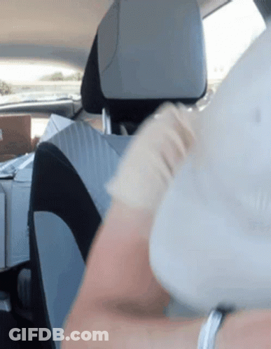 Person Sitting In Car With White Hat GIF