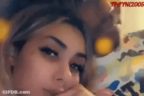Person Sitting In Chair With White Pillow GIF