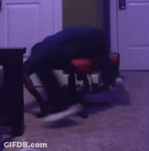 Person Sitting In Dark Room GIF