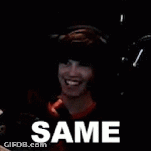 Person Sitting In Dark Room With Word Same GIF