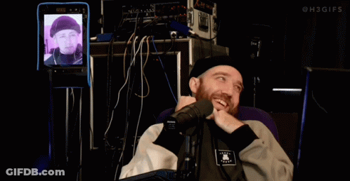 Person Sitting In Front Of Microphone GIF