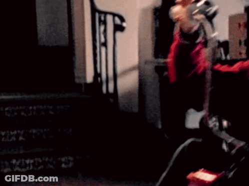 Person Sitting On Chair With Clock On Floor GIF