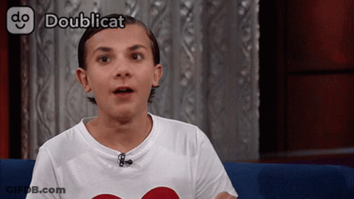 Person Sitting On Couch With Doublicat GIF
