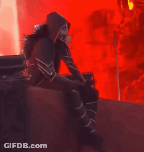 Person Sitting On Red Background GIF