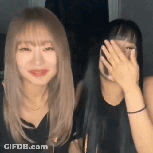 Person Smoking Cigarette In Front Of Mask GIF