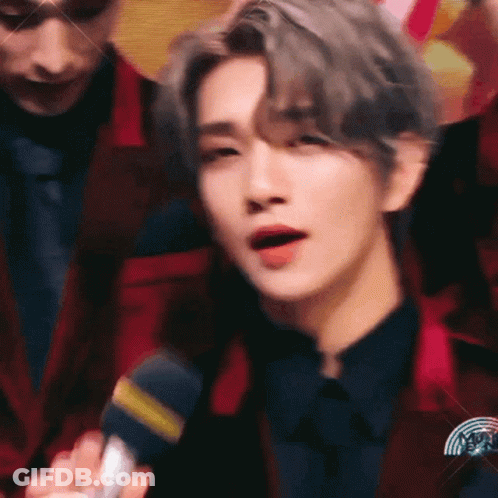 Person Speaking Into Microphone GIF