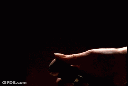 Person Spraying Perfume GIF