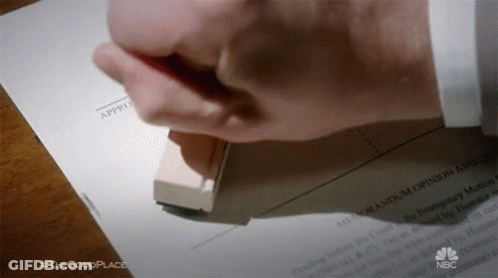 Person Stamping Paper GIF