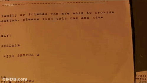 Person Stamping Paper Saying Leeds GIF