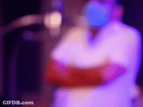 Person Standing At Microphone GIF