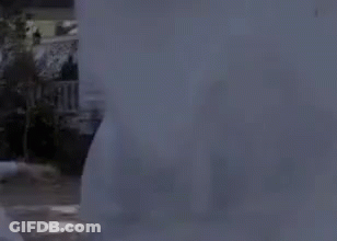 Person Standing Before Haunted House With Ghost GIF