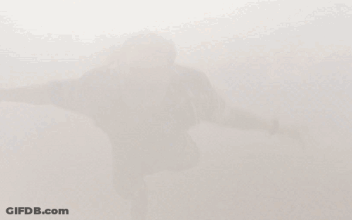 Person Standing In Clouds Feet In Air GIF