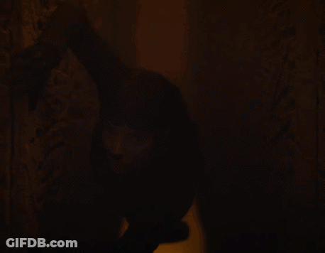 Person Standing In Dark Room GIF