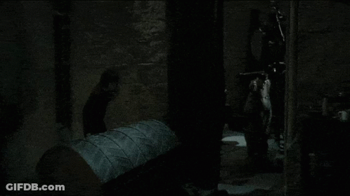 Person Standing In Dark Room GIF
