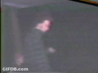 Person Standing In Dark Room GIF