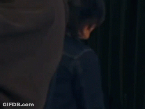 Person Standing In Dark Room Saying Nag Walk Out Na GIF