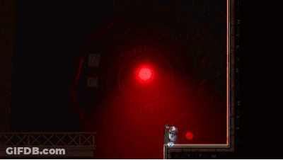 Person Standing In Dark Room With Red Light GIF