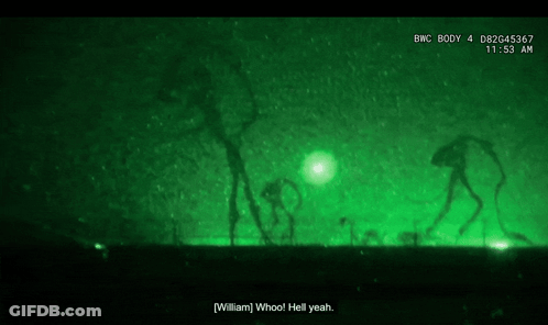 Person Standing In Dark With Green Light GIF