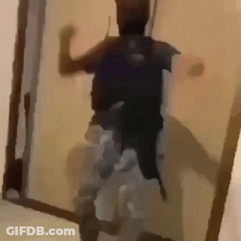 Person Standing In Doorway With Backpack GIF