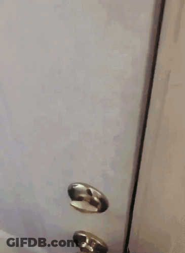 Person Standing In Front Of Camouflage Blanket GIF