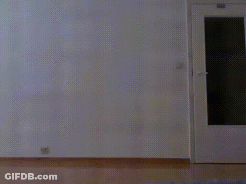 Person Standing In Front Of Door GIF