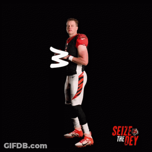 Person Standing In Front Of Large White W GIF