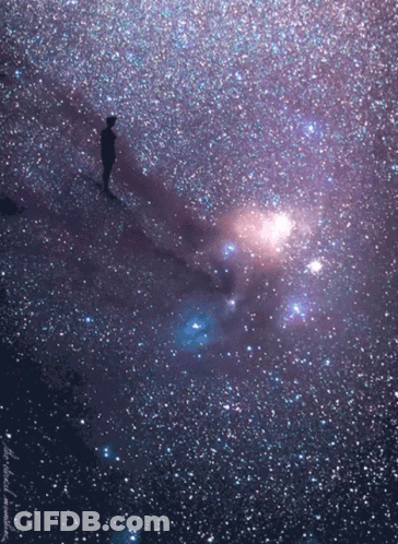 Person Standing In Galaxy GIF