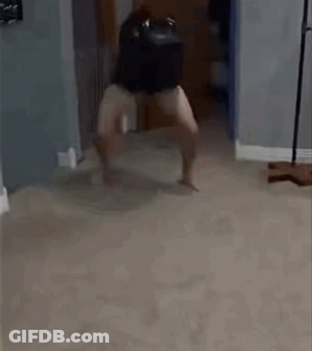 Person Standing In Living Room GIF
