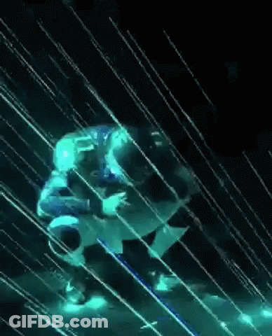 Person Standing In Rain In Dark Room With Glowing Lights GIF