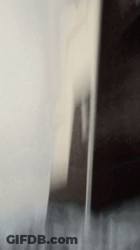 Person Standing In Room GIF