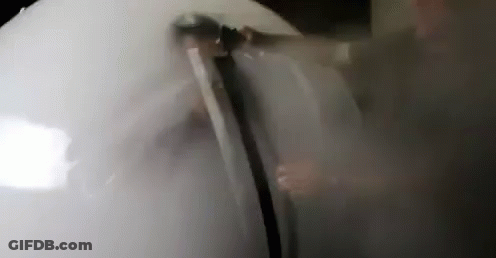 Person Standing In Room With Smoke GIF